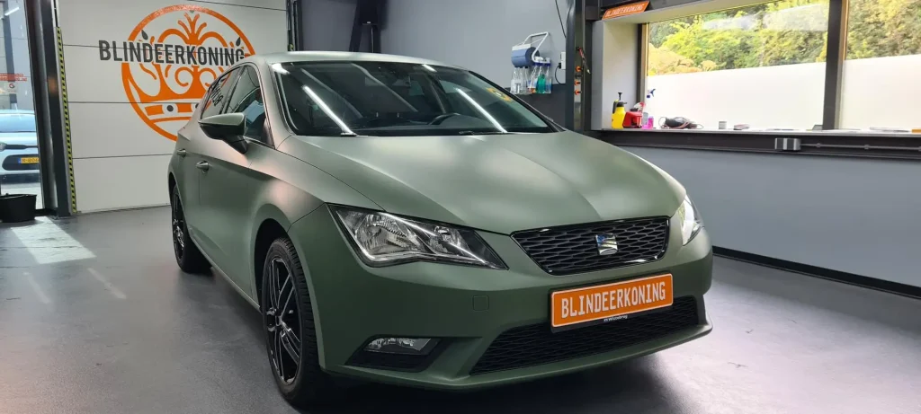 Mat groen gewrapte Seat Leon